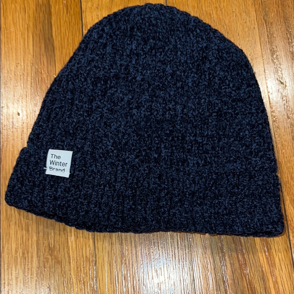 Blue chenille beanie with fleece lining.